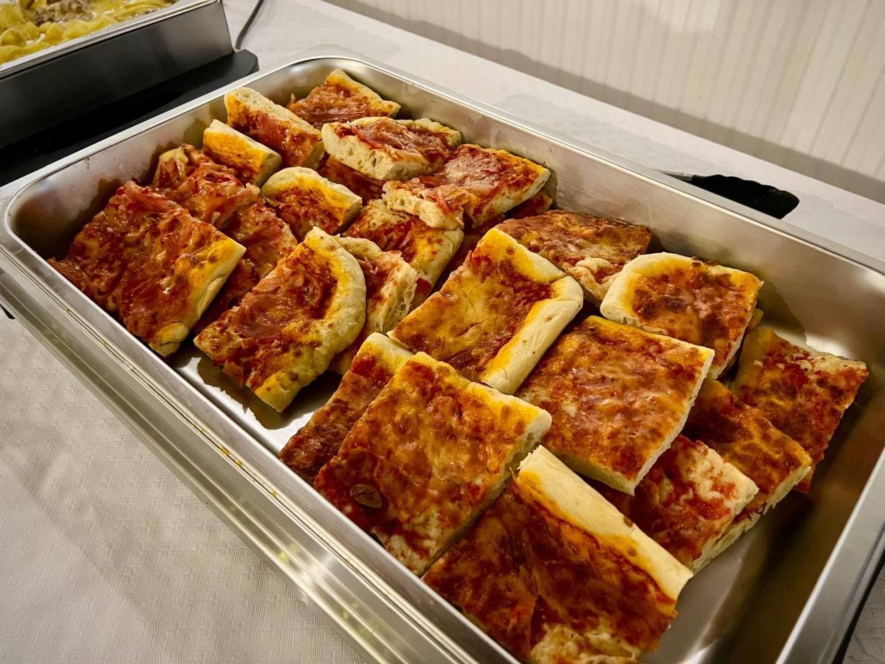 Pizza maison, part de buffet italien